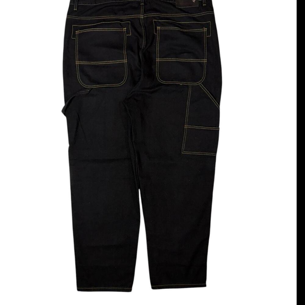 Black denim jeans with yellow